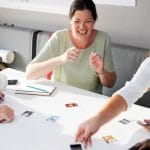 People Looking Choosing at Colleagues Photo