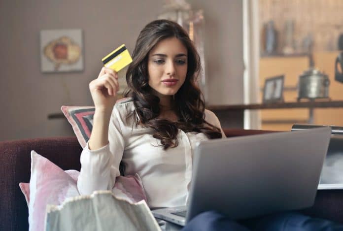 Girl shopping online with credit card