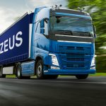 Truck delivers in a city