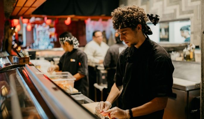 restaurant workers in kitchen